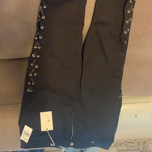 Brand new good American super high rise jeans with cute side details